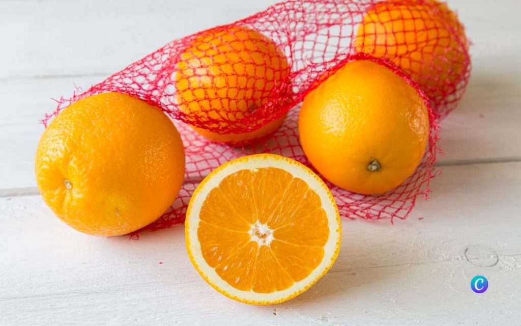 Waarom zijn de Spaanse sinaasappels altijd verpakt in een rood net?